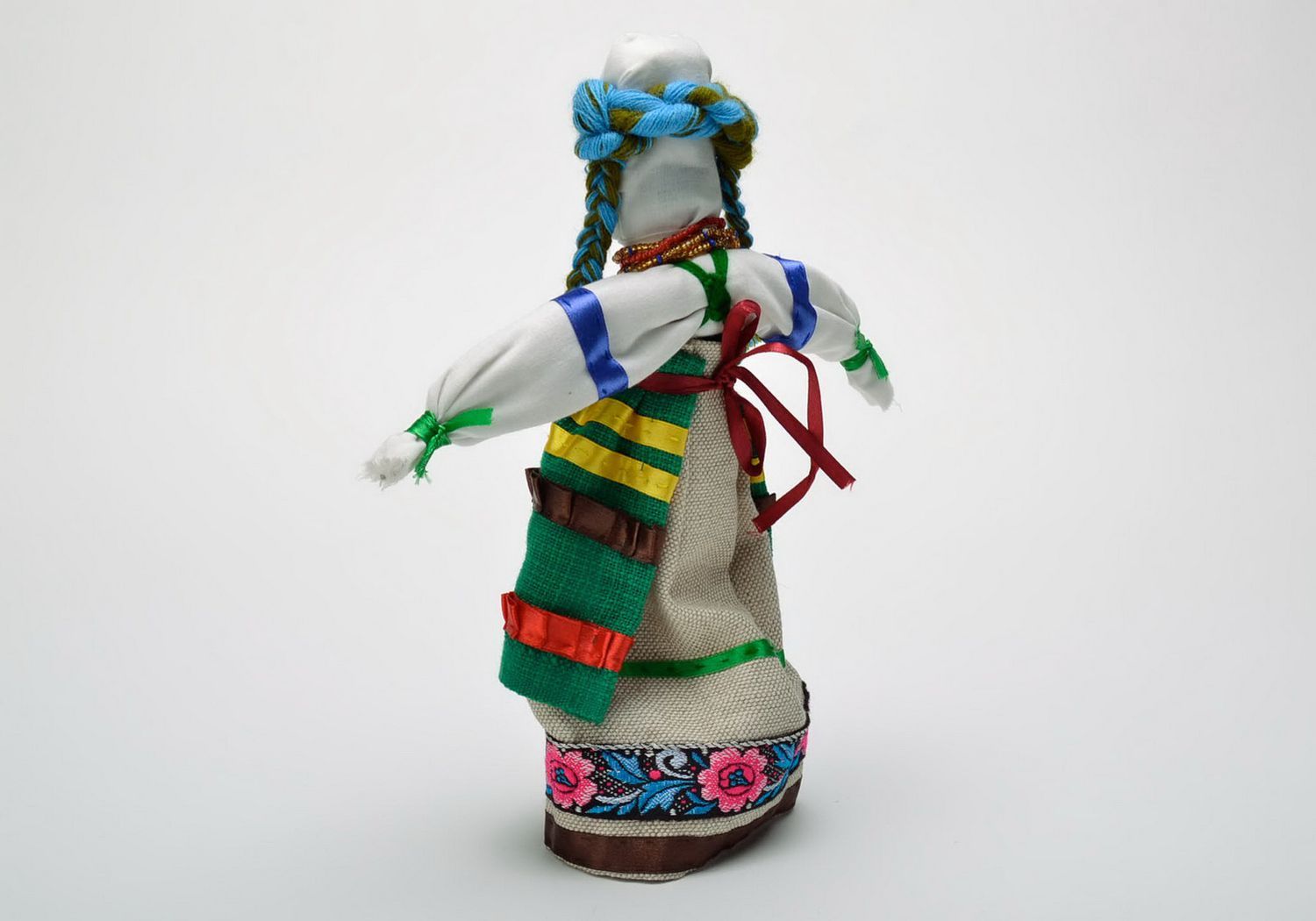 Rag doll with blue ribbons photo 2