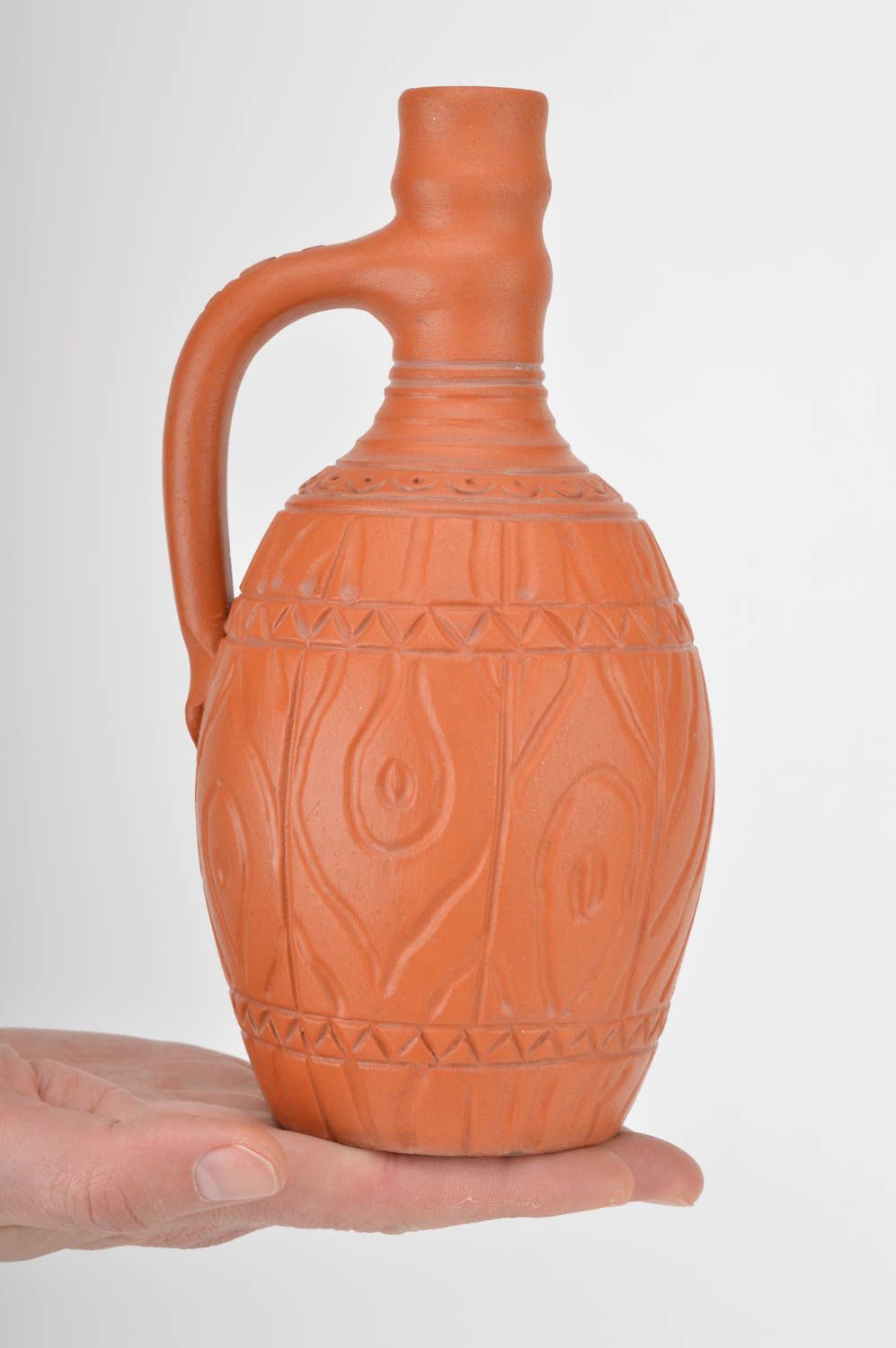 Botella de arcilla decorativa artesanal marrón clara con ornamento 330 ml foto 3