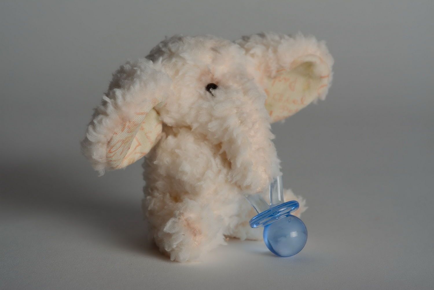 Soft toy, made of frazzle Elephant with pacifier photo 3