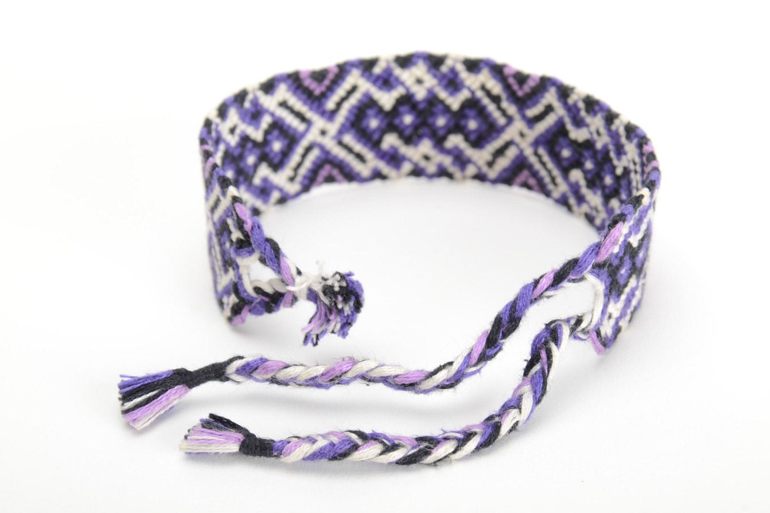 Handmade friendship wrist bracelet woven of threads in ethnic style unisex photo 2