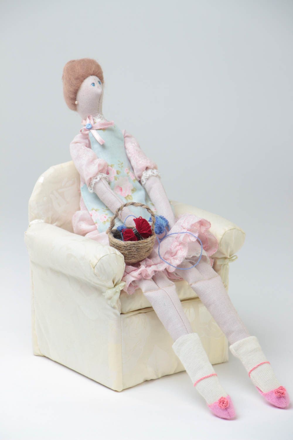 Handmade designer cotton fabric soft doll sitting in arm chair and knitting photo 2