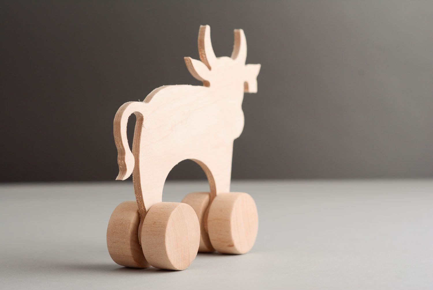 Unusual wooden toy Cow photo 4