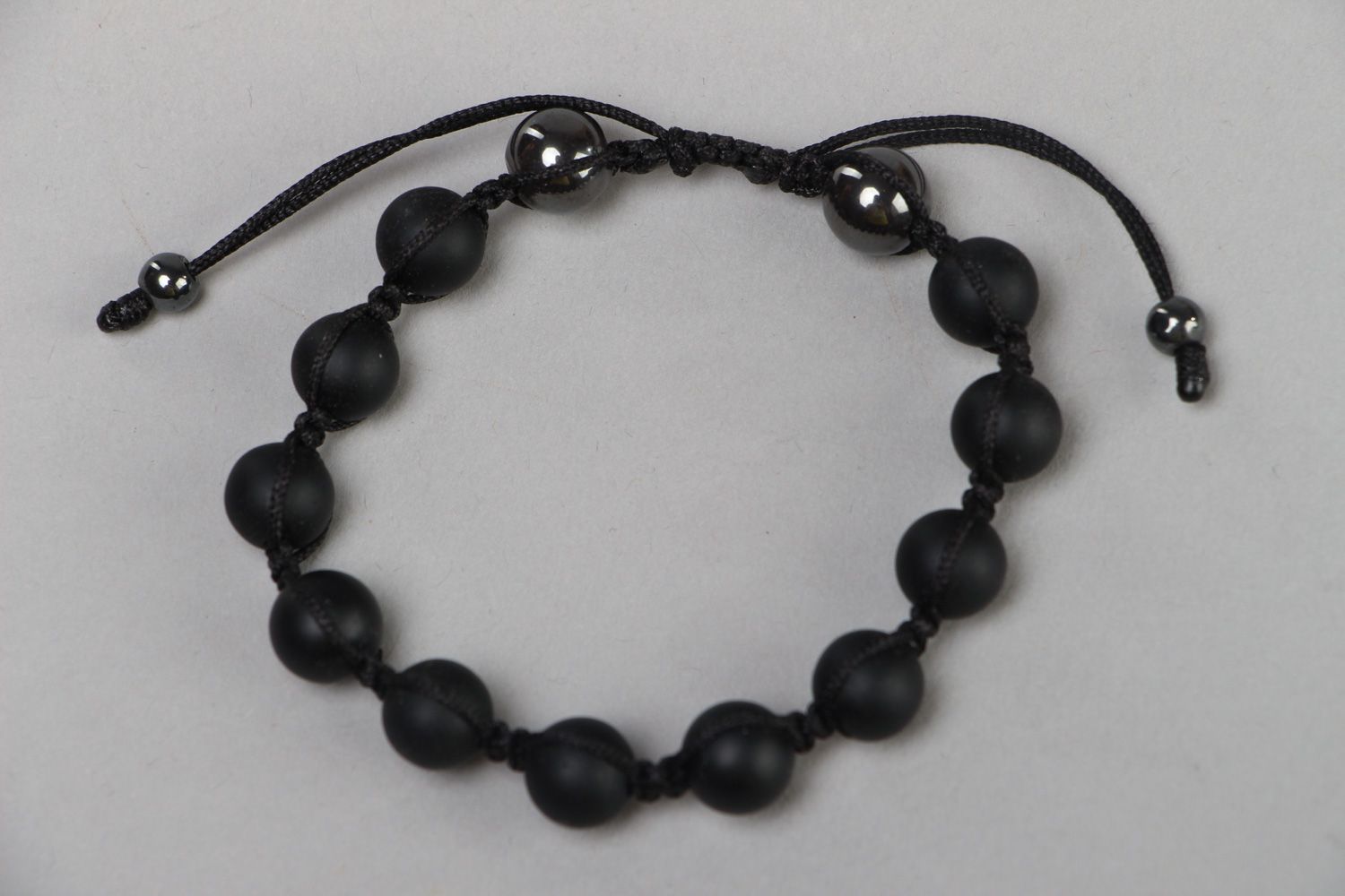 Handmade woven wrist bracelet with black shungite and hematite stone beads  photo 2