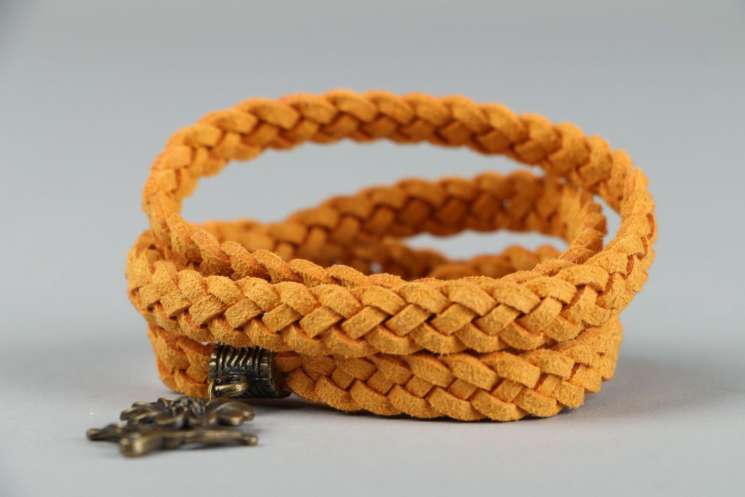 Suede braided bracelet with pendant photo 3