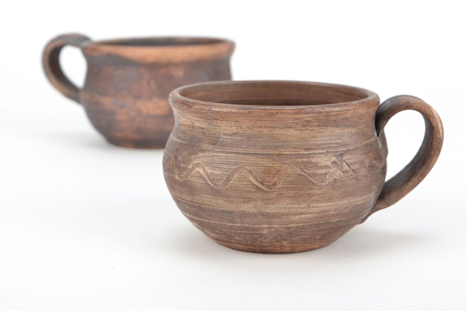 5 oz clay cup with handle and rustic pattern photo 1