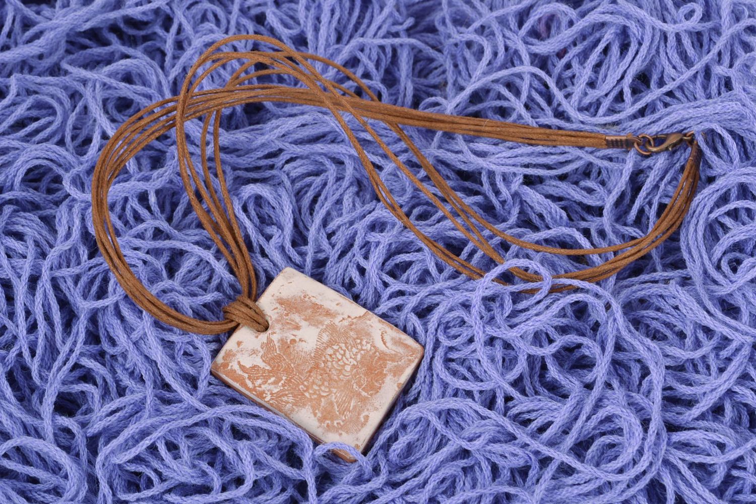 Rectangular ceramic pendant with cord photo 1