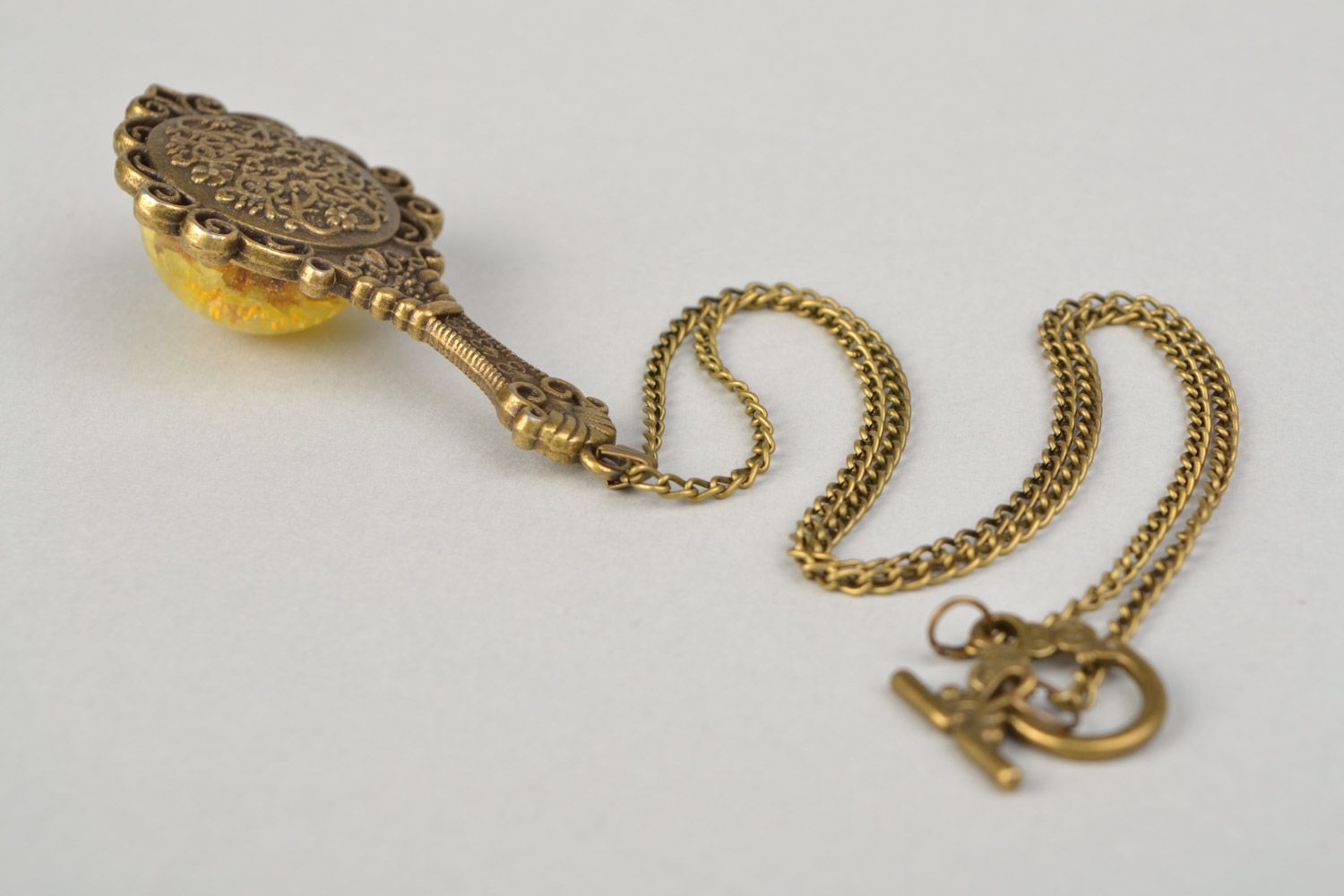 Handmade vintage pendant with chrysanthemum flower is epoxy resin on chain  photo 4