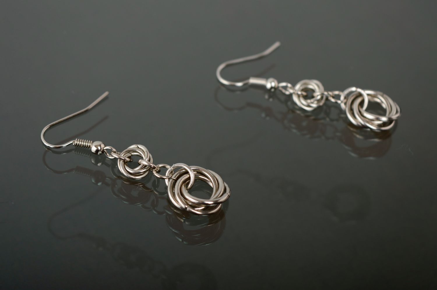 Handmade metal earrings created using chain armor weaving technique photo 2