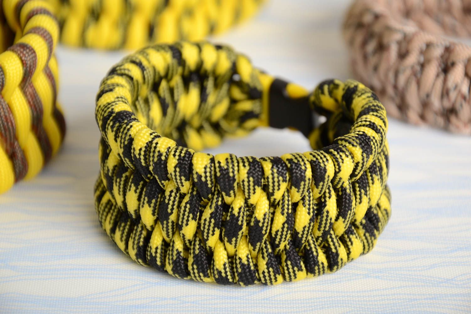 Unusual yellow and black handmade woven paracord bracelet photo 1