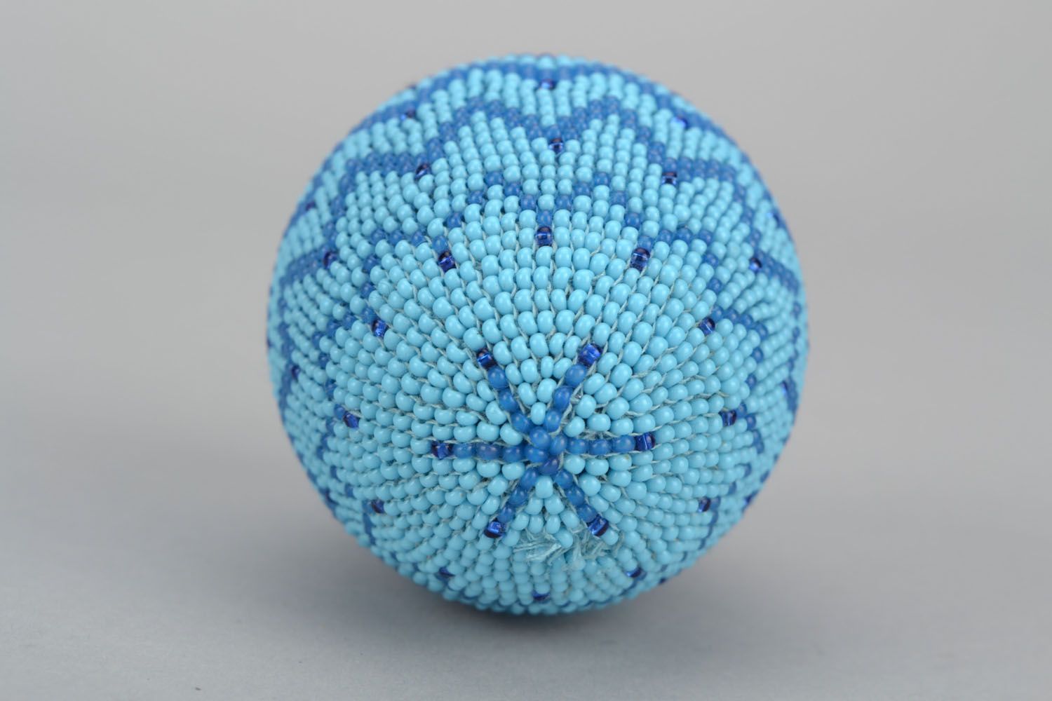 Wooden Easter egg woven over with beads Ice photo 3