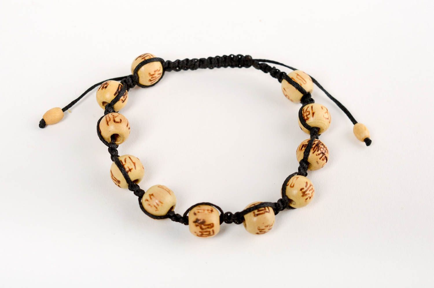 Handmade designer wrist bracelet woven of cord and wooden beads unisex photo 2