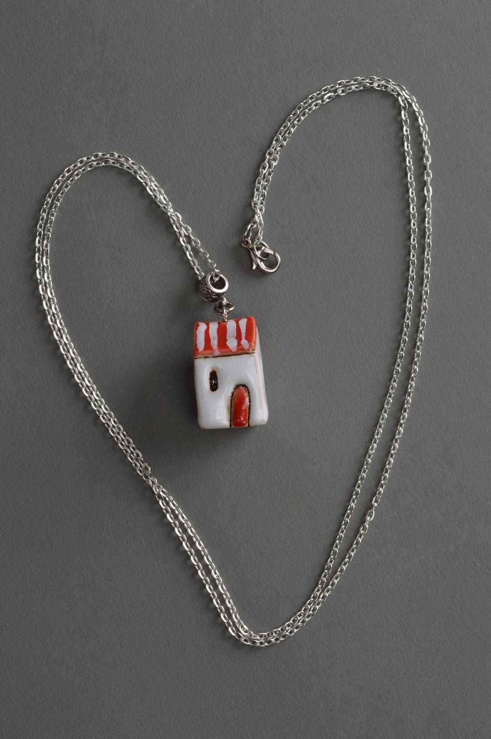 Beautiful handmade designer painted ceramic neck pendant in the shape of house with red roof photo 3