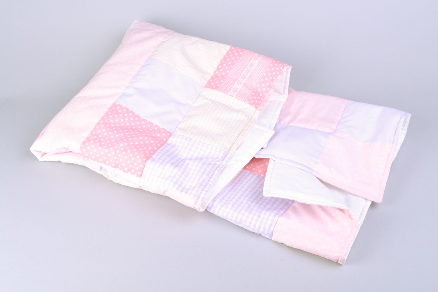 Handmade newborn baby blanket sewn of cotton fabric using patchwork technique photo 3