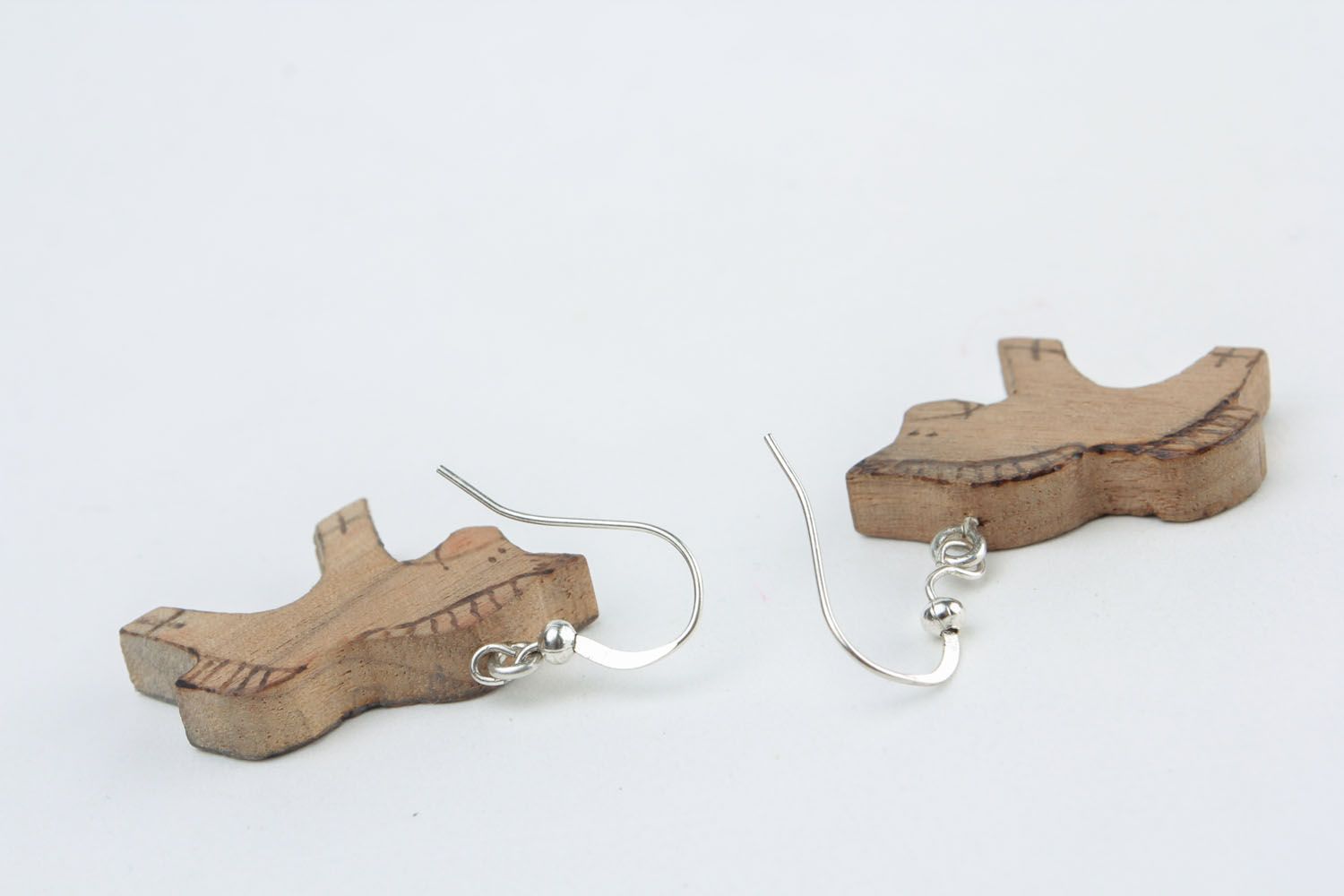 Wooden earrings in the shape of horses photo 4