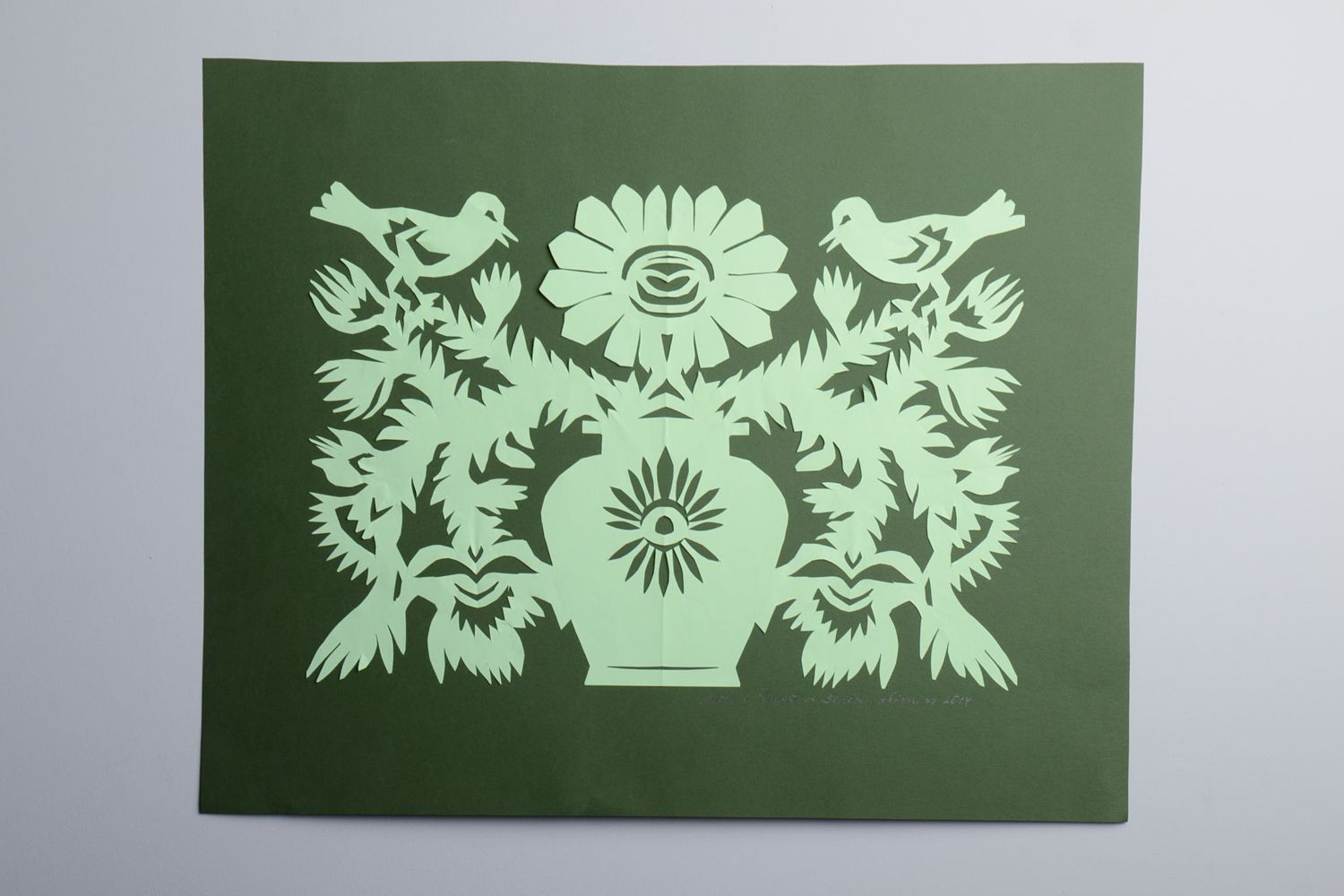 Paper cut out picture on green background Blackthorn photo 1