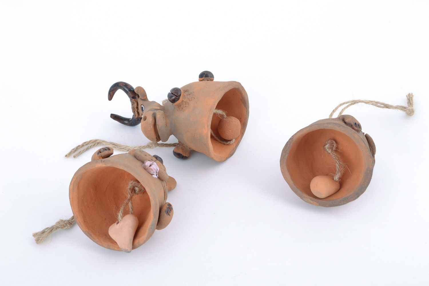 Set of handmade ceramic hanging bells in the shape of traditional toys animals photo 3