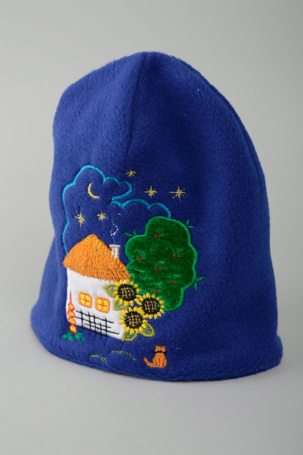 Bonnet bleu en tissu polaire avec paysage rural pour enfant photo 1
