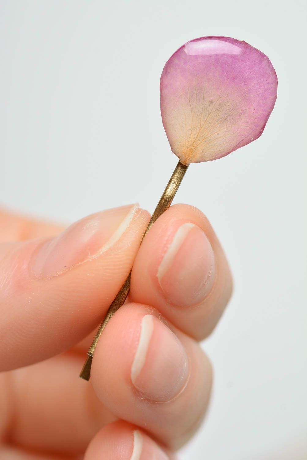Handmade decorative metal hair pin with dried flower petal in epoxy resin photo 3