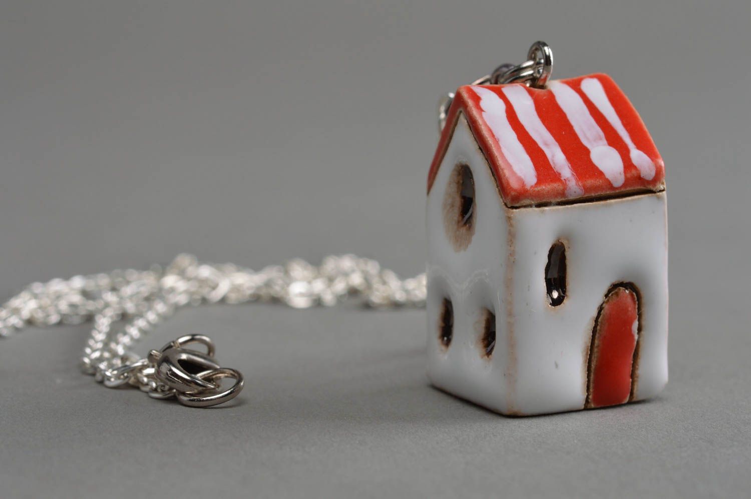 Beautiful handmade designer painted ceramic neck pendant in the shape of house with red roof photo 1