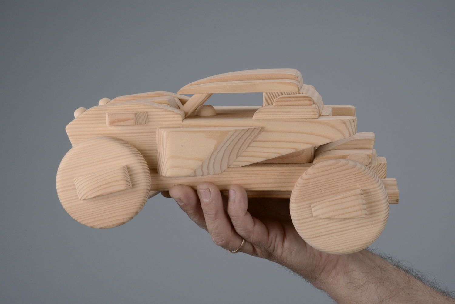 Little car made of wood photo 4