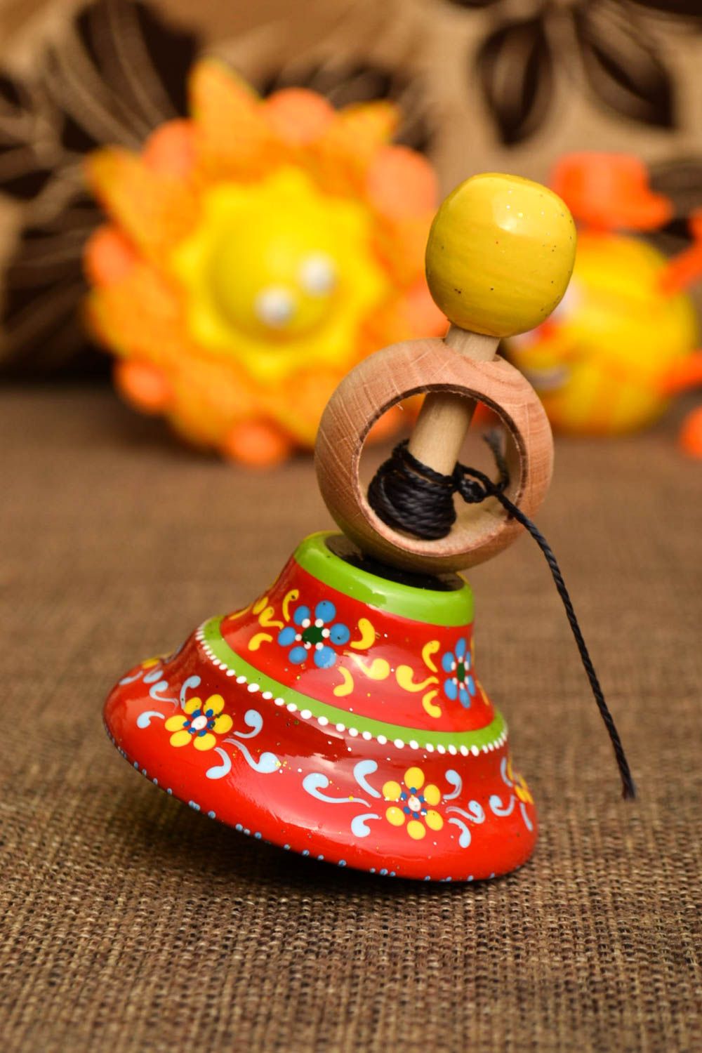 Детская юла игрушка ручной работы экологически чистая игрушка разноцветная фото 1
