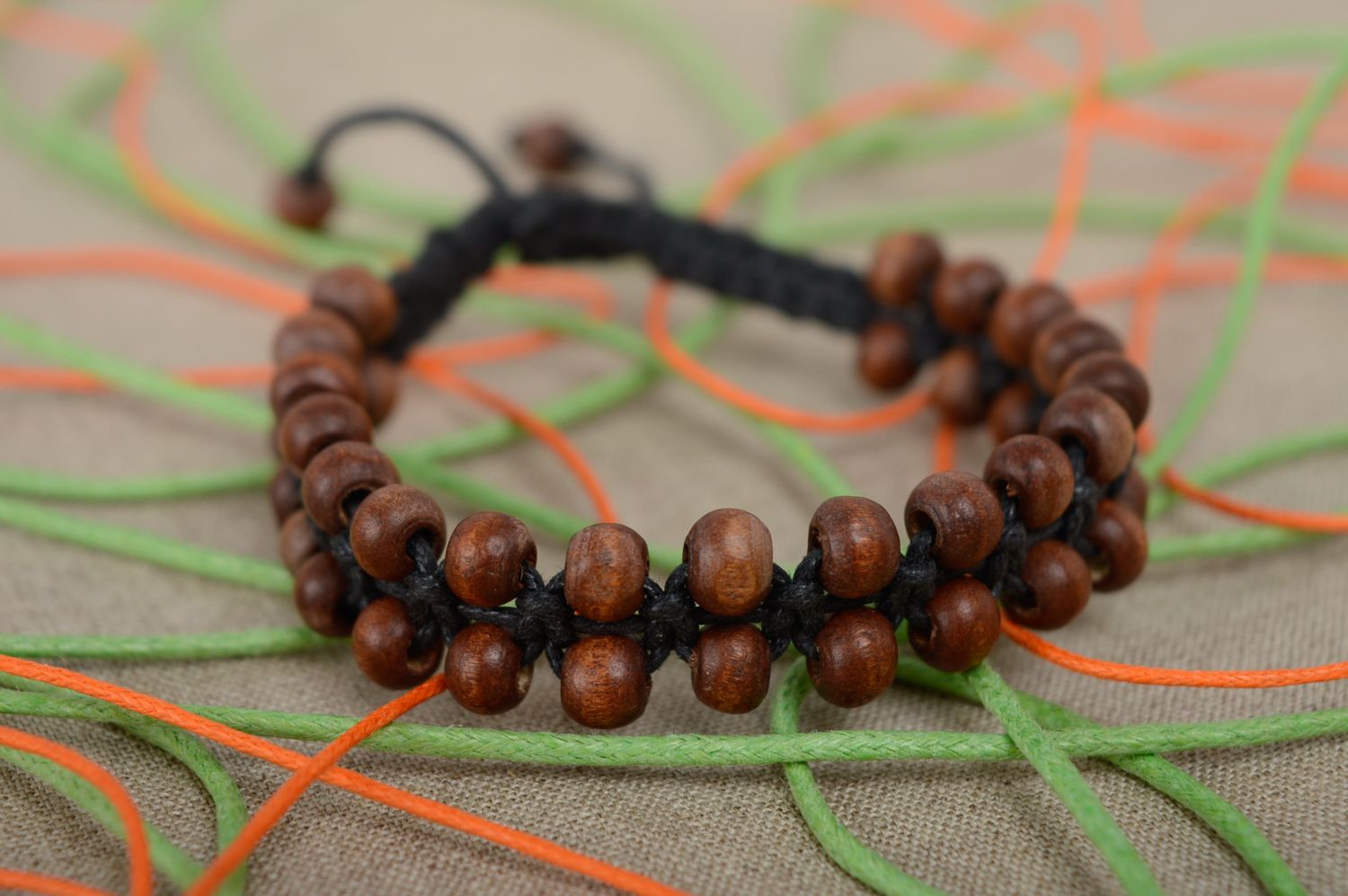 Macrame woven bracelet with wooden beads photo 2