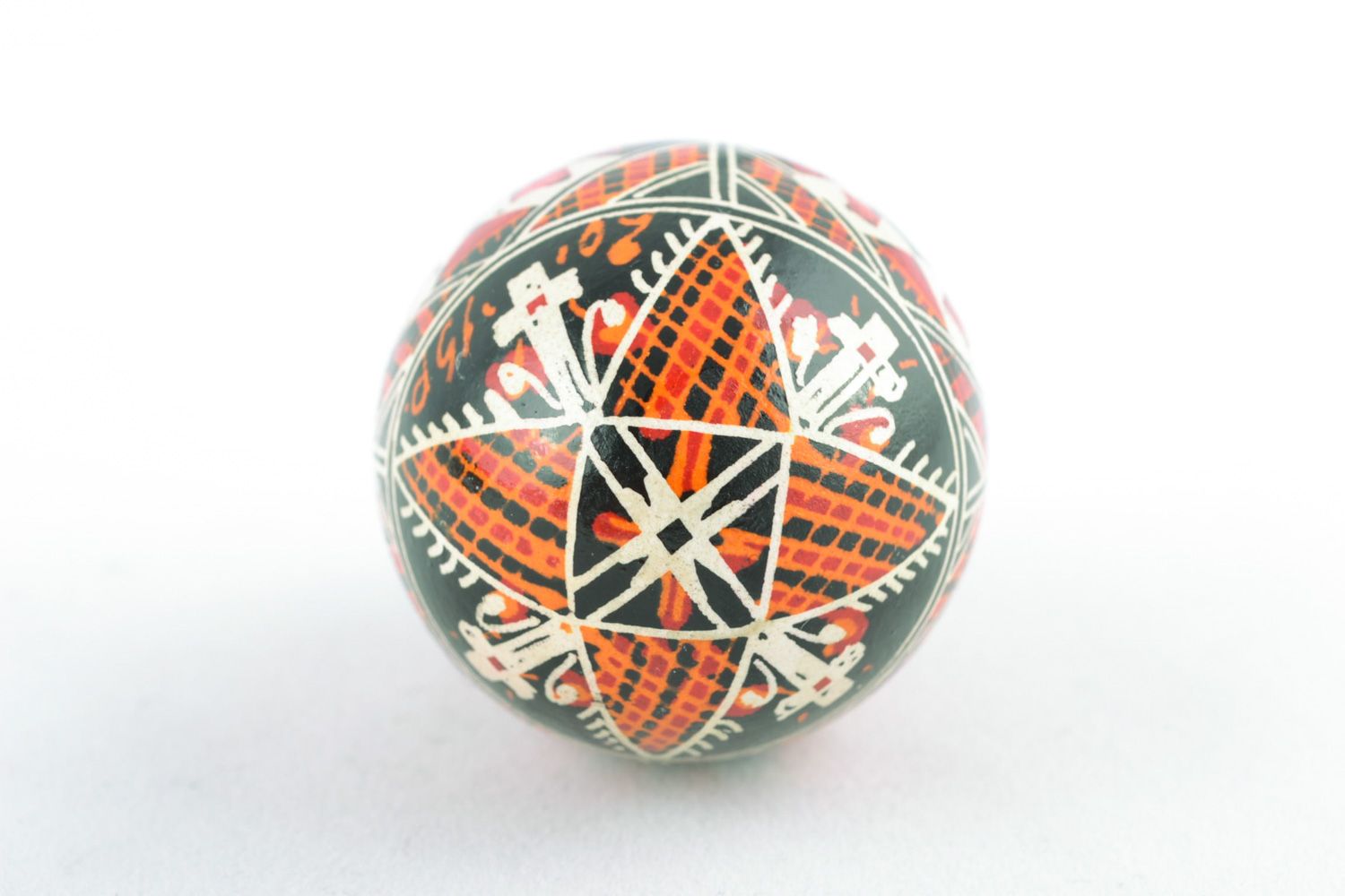 Homemade traditional colorful Easter egg painted with wax and aniline dyes photo 5