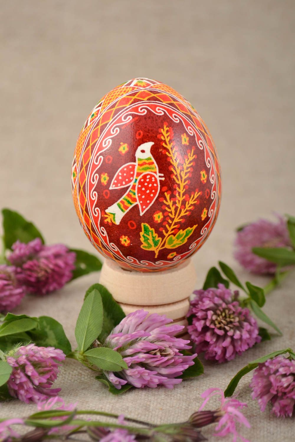 Gift handmade designer painted Easter egg in red color palette Bird photo 1