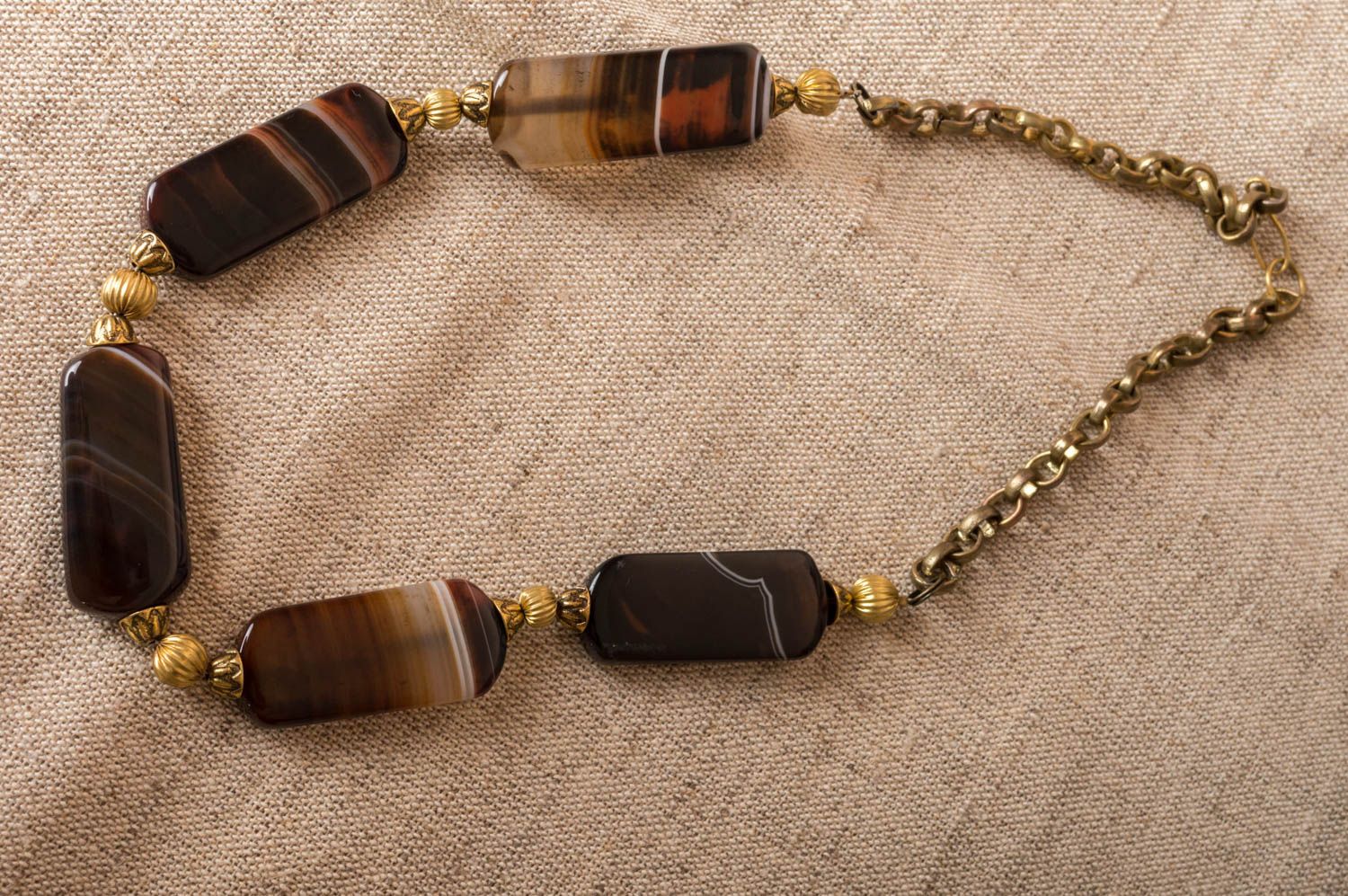Handmade designer women's necklace with natural brown agate stone and latten  photo 1