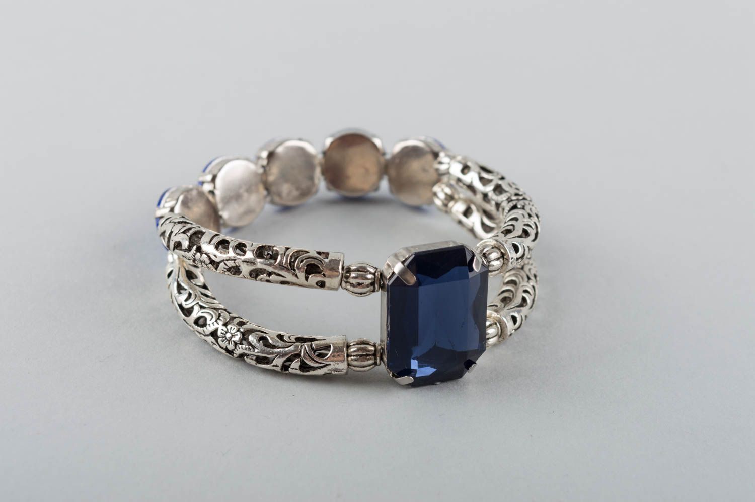 Women's handmade designer metal wrist bracelet with large blue strasses photo 2