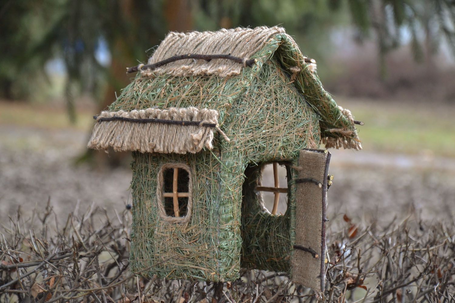Decorative house made of forest grass photo 5