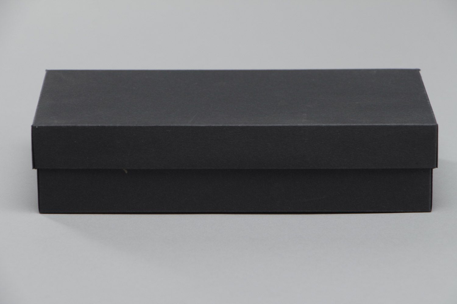 Handmade minimalistic carton gift box of rectangular shape of black color photo 2