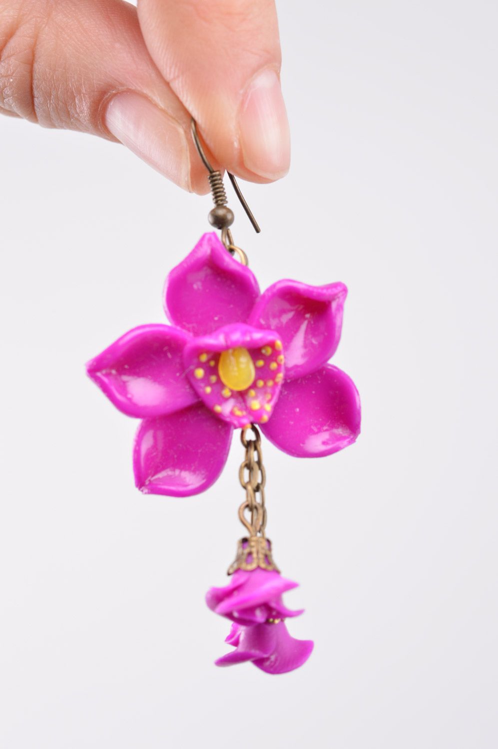 Homemade long plastic flower earrings with charms in the shape of orchids photo 1
