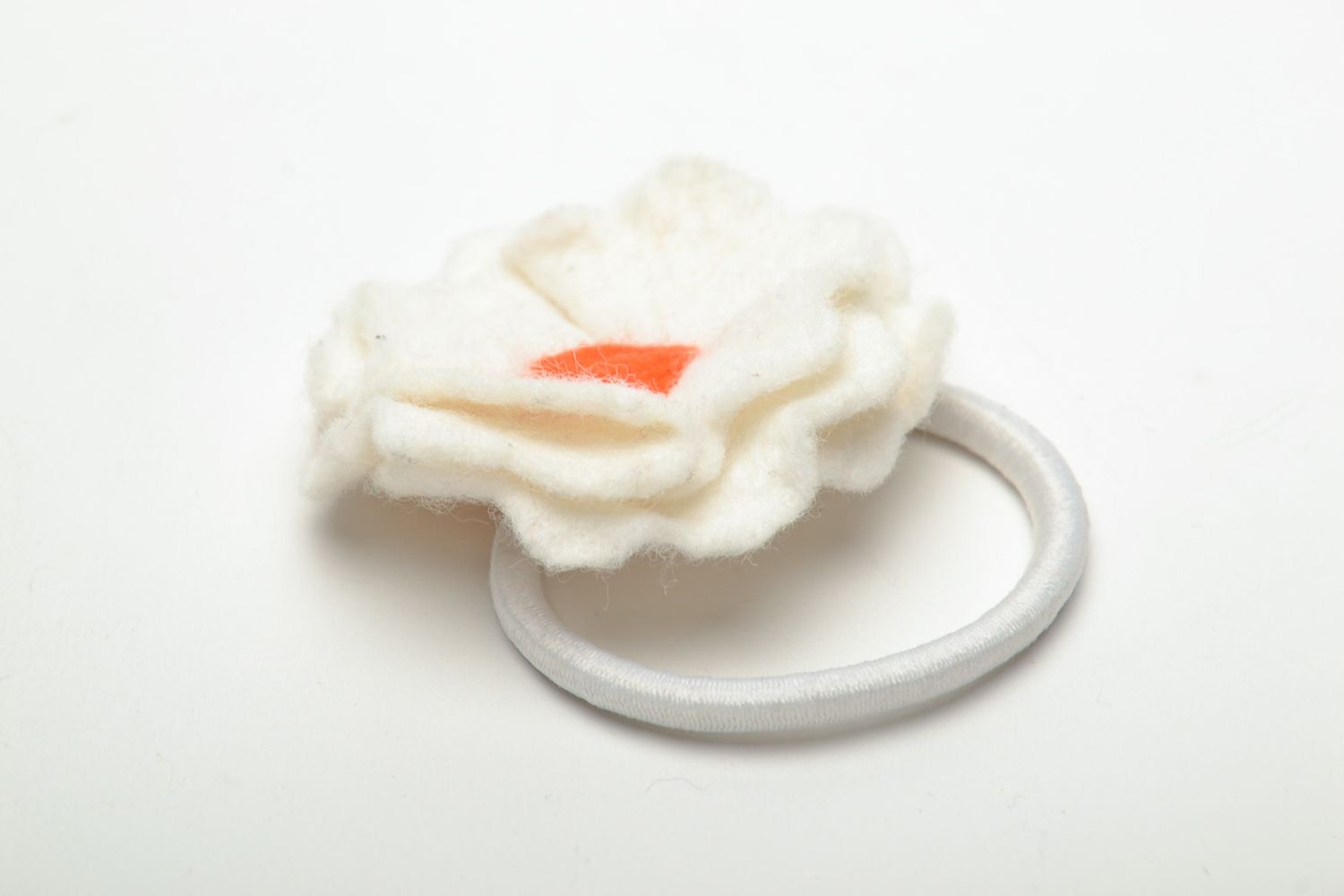 Beautiful tender hair tie with white flower photo 4