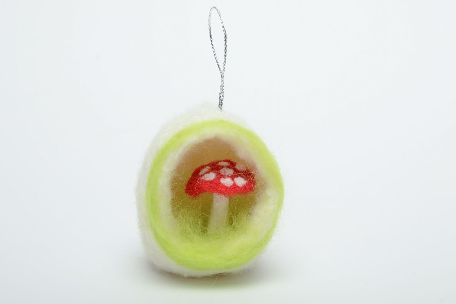 Felted toy with eyelet photo 2