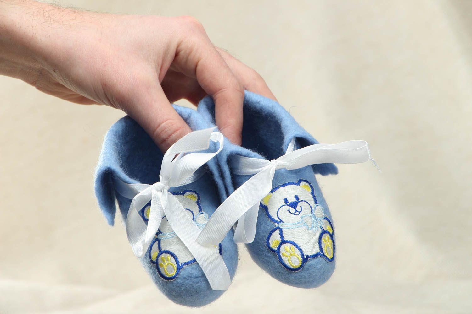 Zapatillas de lana natural para bebés foto 4