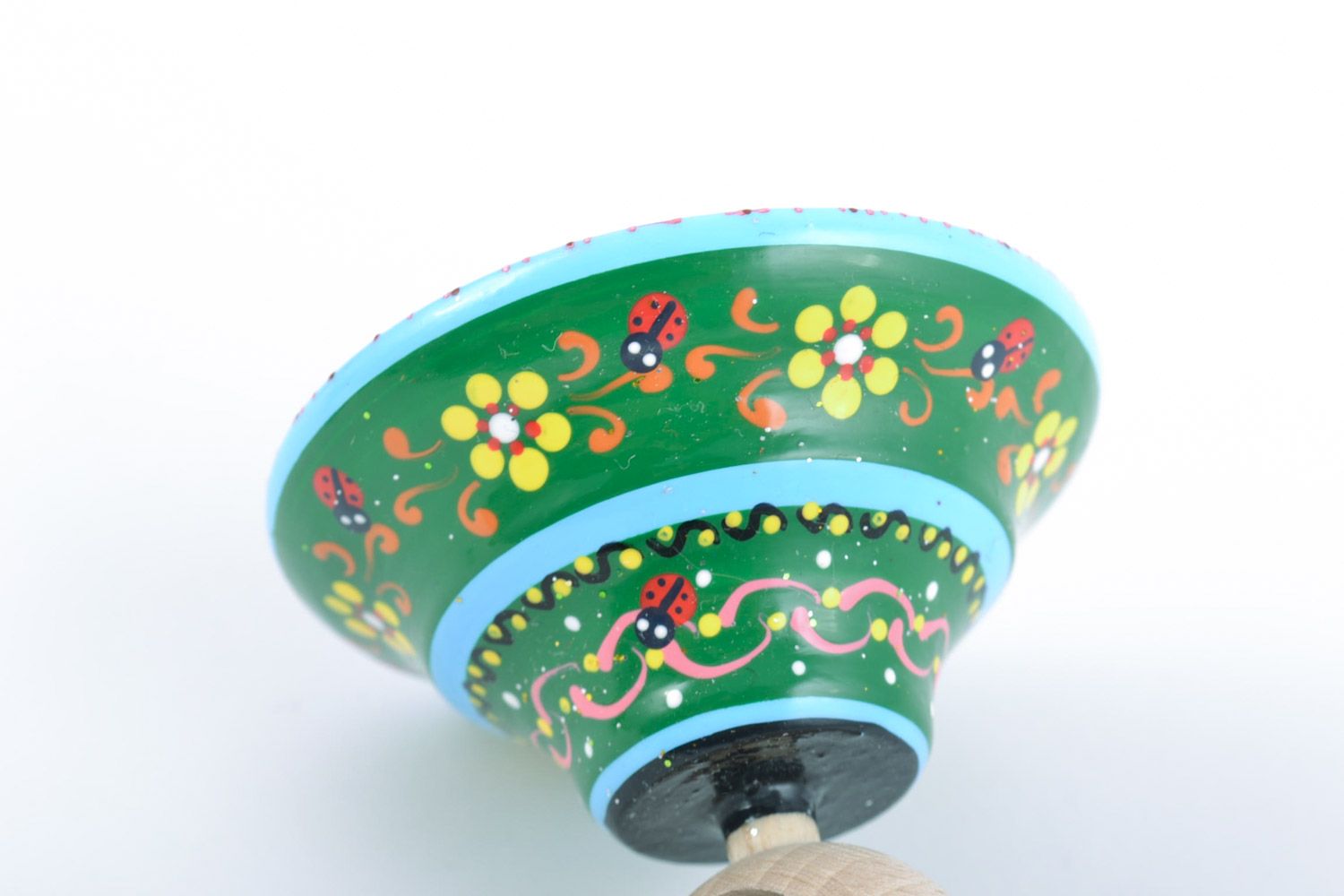Handmade educational wooden eco toy spinning top painted in green color palette photo 4