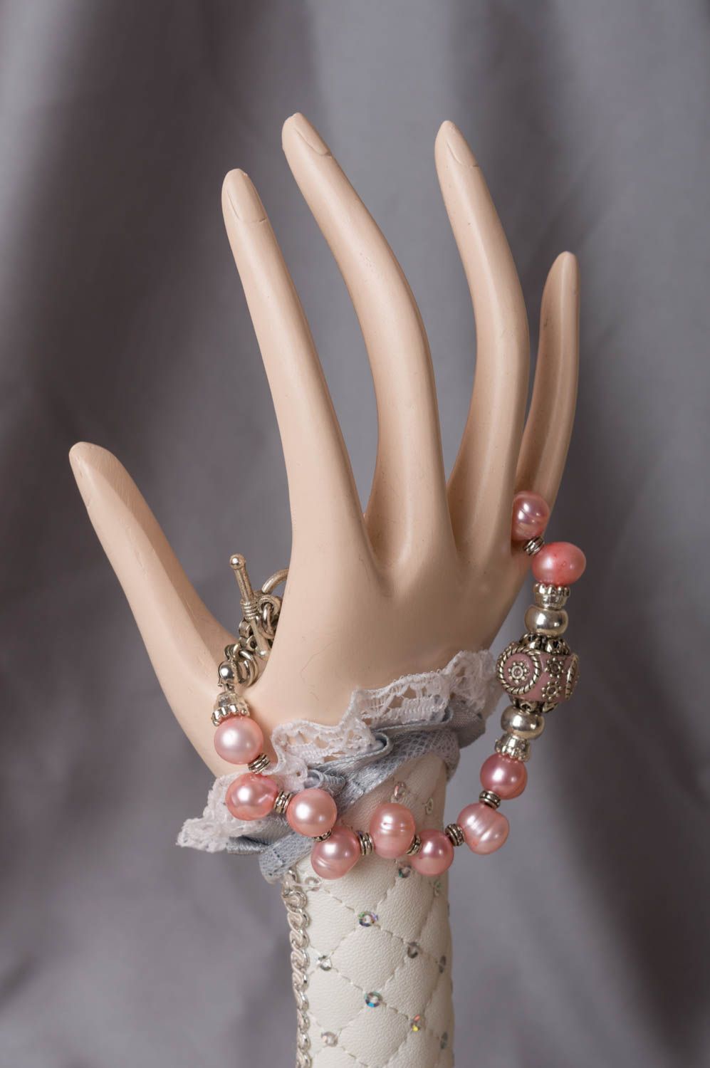 Handmade cute designer bracelet made of pearls and brass in pink coloring photo 1