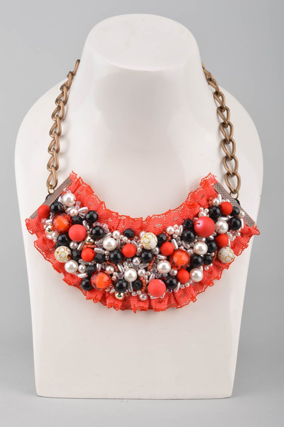 Designer beautiful massive necklace on chain made of metal with beads and lace photo 1