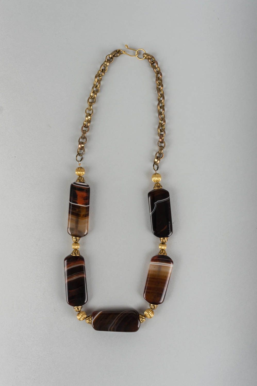 Handmade designer women's necklace with natural brown agate stone and latten  photo 2