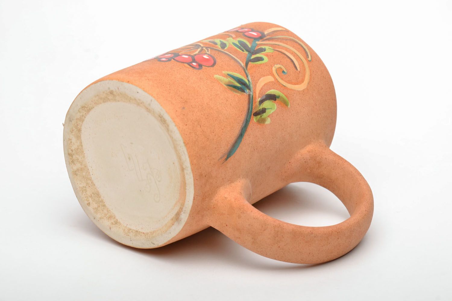 Handmade natural clay glazed coffee mug with handle and hand-painted floral pattern photo 4