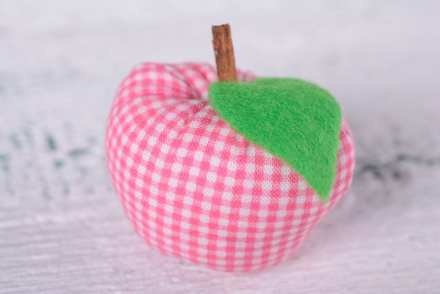 Handmade interior soft toy sewn of cotton in the shape of checkered apple photo 2