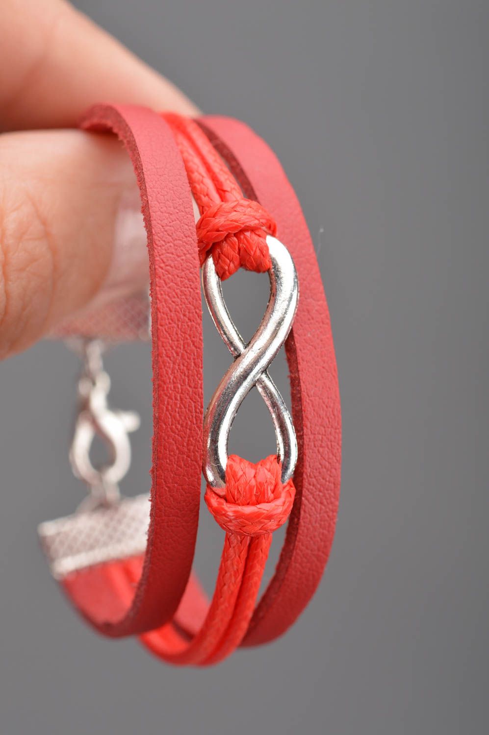 Handmade designer red genuine leather cord wrist bracelet with infinity sign photo 2