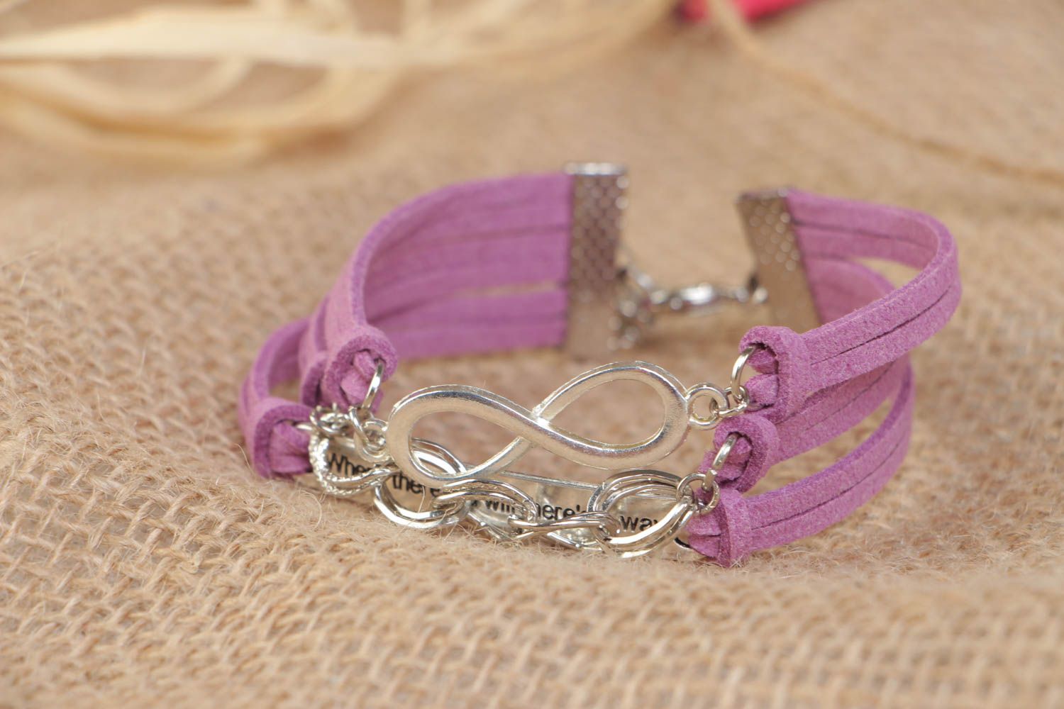 Handmade designer pink artificial suede cord bracelet with charms photo 1