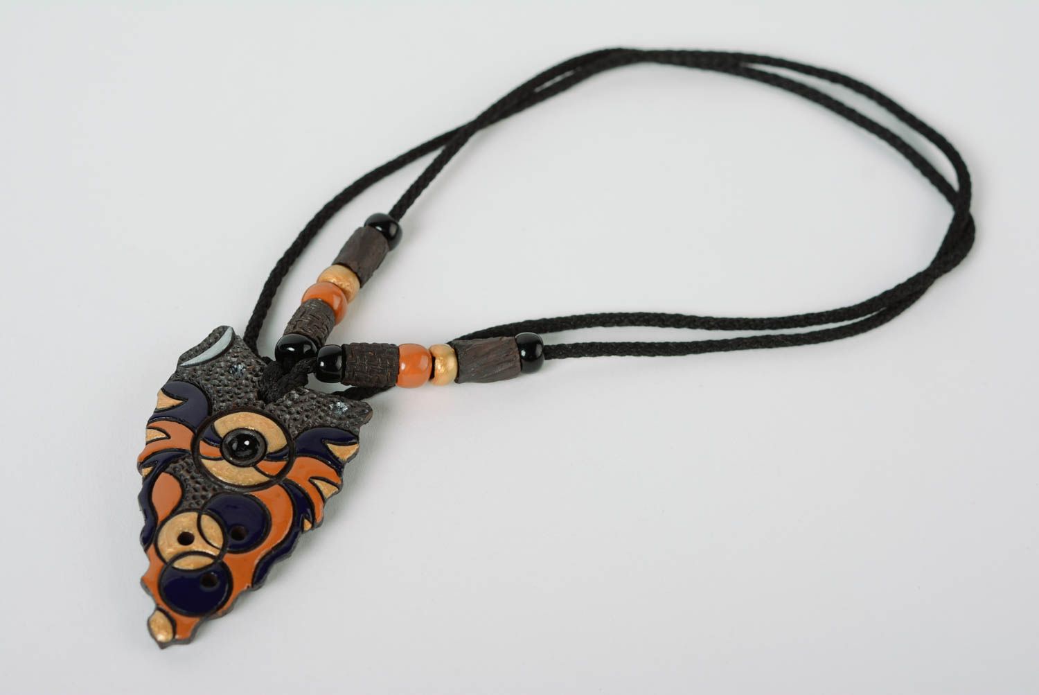 Handmade clay pendant painted with enamels on long string of unusual shape photo 1