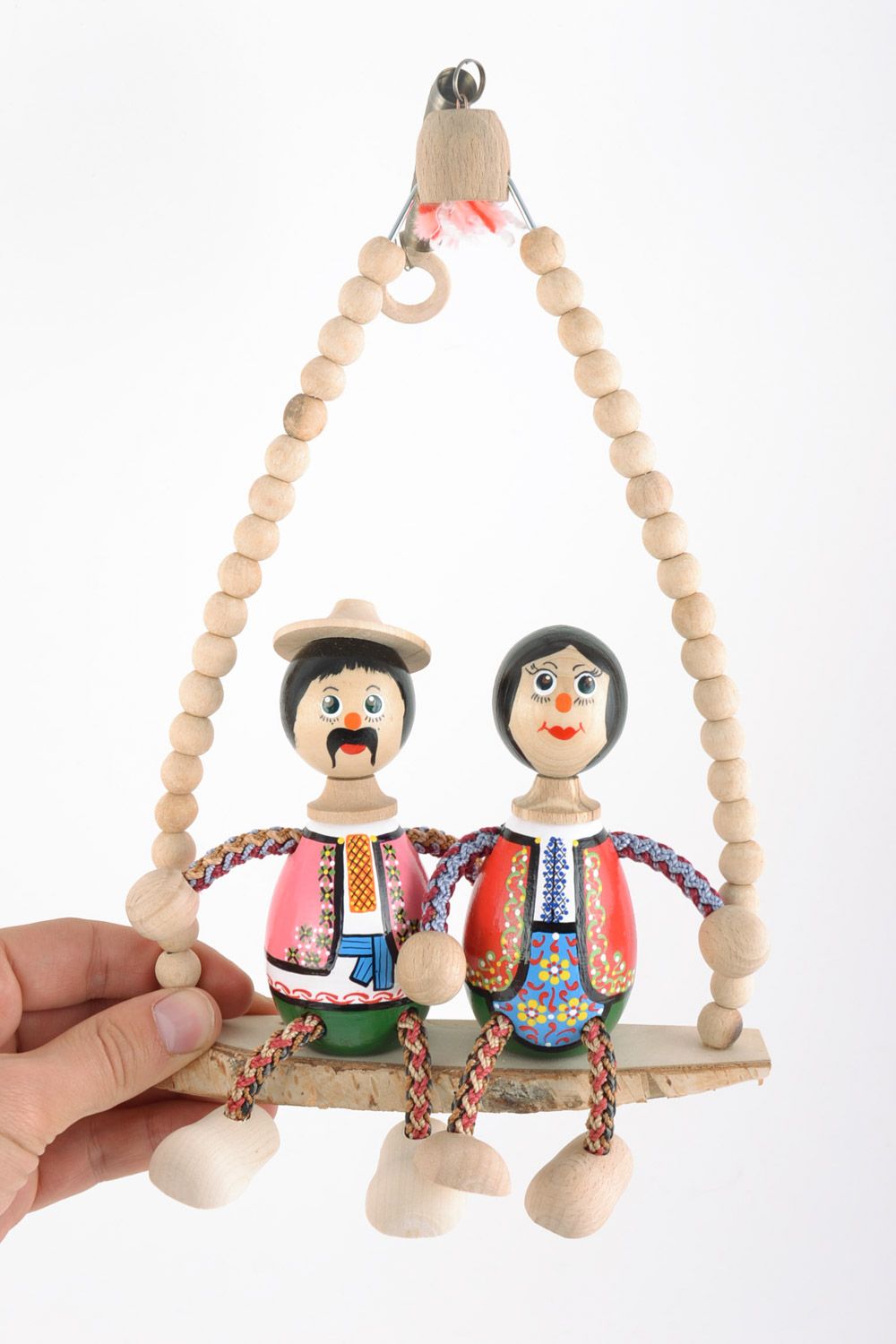 Handmade painted interior wooden toy wife and husband sitting on bench photo 2