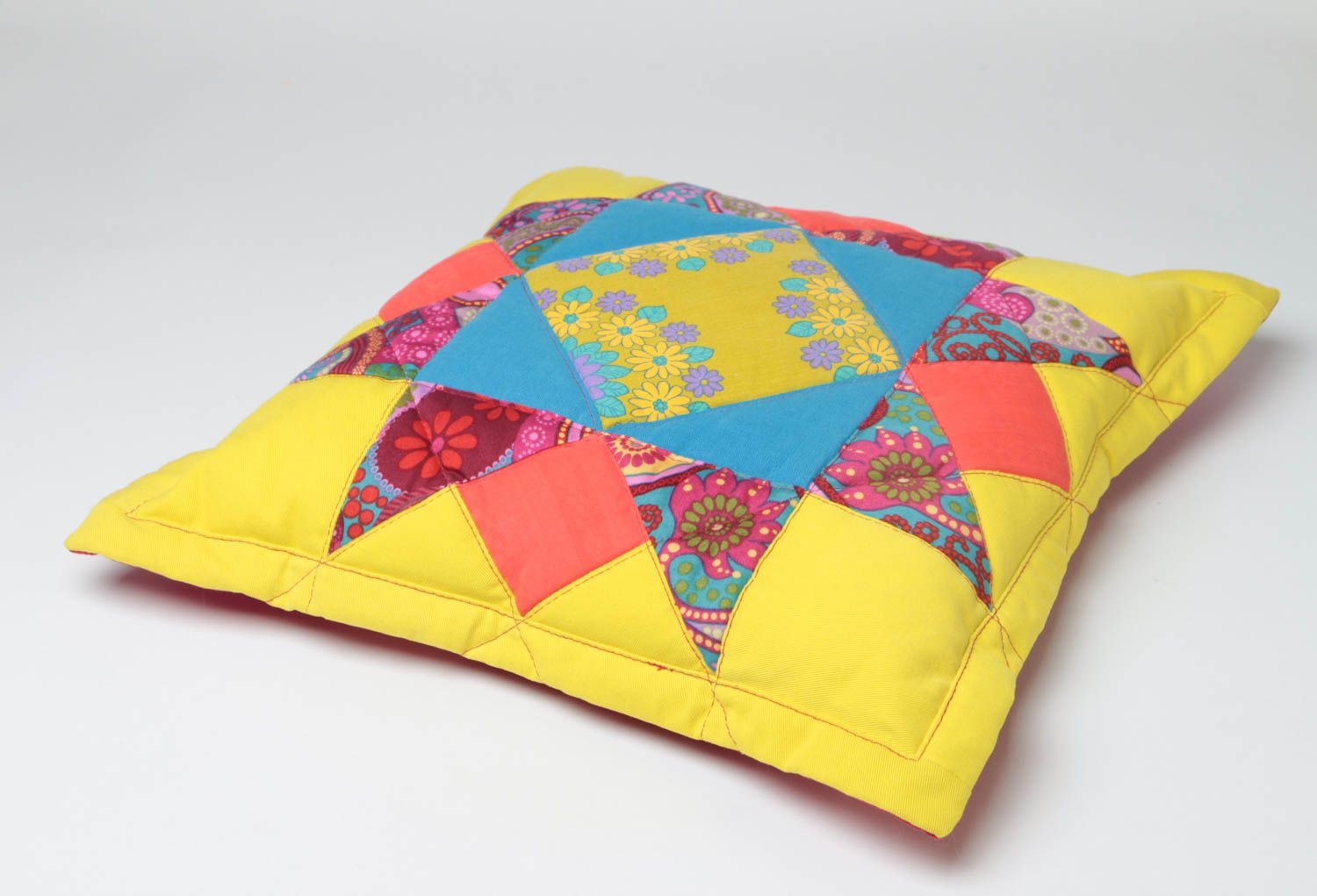 Colorful handmade cotton fabric patchwork cushion of yellow color photo 2