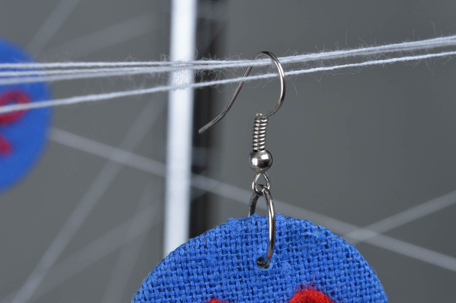 Handmade small round bright blue fabric dangling earrings with red bows photo 1