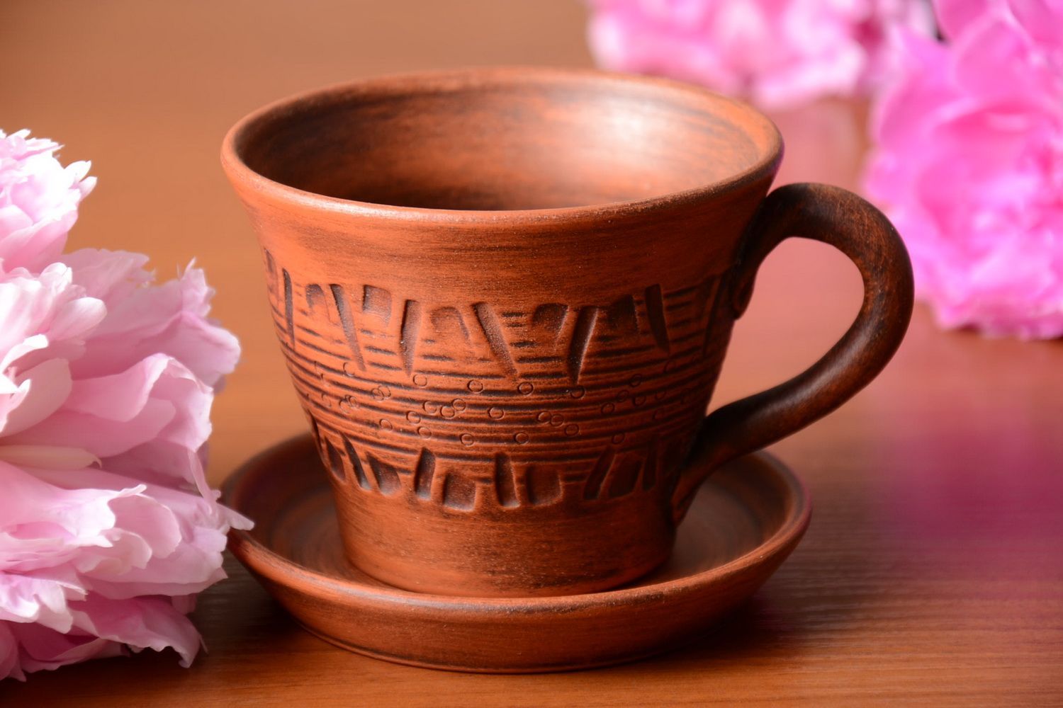 Tazza in ceramica con piattino fatta a mano calice in argilla utensili da cucina foto 1