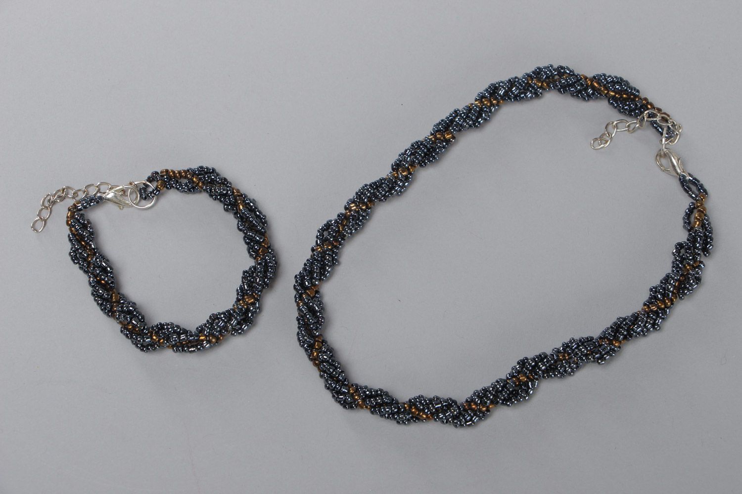 Handmade designer evening beaded jewelry set necklace and bracelet of gray color photo 2